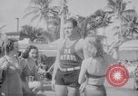 Image of Beach patrol officials and swimsuit models Miami Beach Florida USA, 1938, second 38 stock footage video 65675028768
