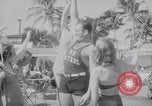 Image of Beach patrol officials and swimsuit models Miami Beach Florida USA, 1938, second 39 stock footage video 65675028768