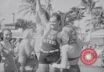 Image of Beach patrol officials and swimsuit models Miami Beach Florida USA, 1938, second 40 stock footage video 65675028768