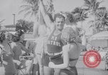 Image of Beach patrol officials and swimsuit models Miami Beach Florida USA, 1938, second 41 stock footage video 65675028768