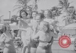 Image of Beach patrol officials and swimsuit models Miami Beach Florida USA, 1938, second 43 stock footage video 65675028768
