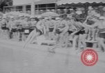 Image of Beach patrol officials and swimsuit models Miami Beach Florida USA, 1938, second 50 stock footage video 65675028768