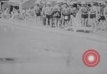 Image of Beach patrol officials and swimsuit models Miami Beach Florida USA, 1938, second 52 stock footage video 65675028768