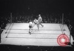 Image of Kimon Kudo beats Jesse James in wrestling New York United States USA, 1938, second 5 stock footage video 65675028783