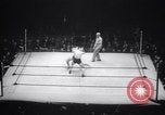 Image of Kimon Kudo beats Jesse James in wrestling New York United States USA, 1938, second 6 stock footage video 65675028783