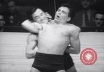 Image of Kimon Kudo beats Jesse James in wrestling New York United States USA, 1938, second 7 stock footage video 65675028783