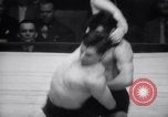 Image of Kimon Kudo beats Jesse James in wrestling New York United States USA, 1938, second 8 stock footage video 65675028783