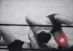 Image of Kimon Kudo beats Jesse James in wrestling New York United States USA, 1938, second 9 stock footage video 65675028783