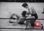 Image of Kimon Kudo beats Jesse James in wrestling New York United States USA, 1938, second 11 stock footage video 65675028783