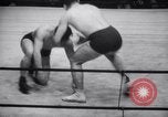 Image of Kimon Kudo beats Jesse James in wrestling New York United States USA, 1938, second 12 stock footage video 65675028783