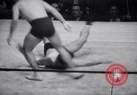 Image of Kimon Kudo beats Jesse James in wrestling New York United States USA, 1938, second 15 stock footage video 65675028783