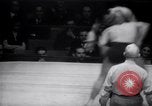 Image of Kimon Kudo beats Jesse James in wrestling New York United States USA, 1938, second 17 stock footage video 65675028783