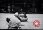 Image of Kimon Kudo beats Jesse James in wrestling New York United States USA, 1938, second 18 stock footage video 65675028783