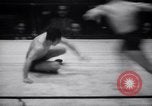 Image of Kimon Kudo beats Jesse James in wrestling New York United States USA, 1938, second 19 stock footage video 65675028783