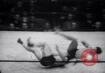 Image of Kimon Kudo beats Jesse James in wrestling New York United States USA, 1938, second 23 stock footage video 65675028783