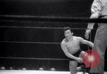 Image of Kimon Kudo beats Jesse James in wrestling New York United States USA, 1938, second 26 stock footage video 65675028783
