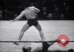 Image of Kimon Kudo beats Jesse James in wrestling New York United States USA, 1938, second 30 stock footage video 65675028783