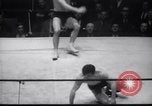 Image of Kimon Kudo beats Jesse James in wrestling New York United States USA, 1938, second 31 stock footage video 65675028783