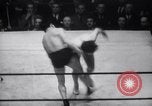 Image of Kimon Kudo beats Jesse James in wrestling New York United States USA, 1938, second 32 stock footage video 65675028783
