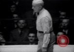 Image of Kimon Kudo beats Jesse James in wrestling New York United States USA, 1938, second 33 stock footage video 65675028783
