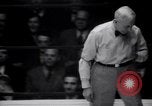 Image of Kimon Kudo beats Jesse James in wrestling New York United States USA, 1938, second 34 stock footage video 65675028783