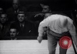 Image of Kimon Kudo beats Jesse James in wrestling New York United States USA, 1938, second 35 stock footage video 65675028783
