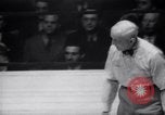Image of Kimon Kudo beats Jesse James in wrestling New York United States USA, 1938, second 36 stock footage video 65675028783