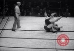 Image of Kimon Kudo beats Jesse James in wrestling New York United States USA, 1938, second 37 stock footage video 65675028783