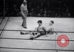 Image of Kimon Kudo beats Jesse James in wrestling New York United States USA, 1938, second 38 stock footage video 65675028783