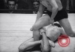 Image of Kimon Kudo beats Jesse James in wrestling New York United States USA, 1938, second 41 stock footage video 65675028783
