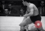 Image of Kimon Kudo beats Jesse James in wrestling New York United States USA, 1938, second 43 stock footage video 65675028783