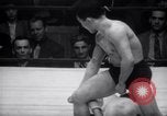 Image of Kimon Kudo beats Jesse James in wrestling New York United States USA, 1938, second 44 stock footage video 65675028783