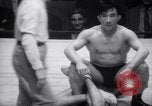 Image of Kimon Kudo beats Jesse James in wrestling New York United States USA, 1938, second 47 stock footage video 65675028783