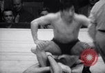Image of Kimon Kudo beats Jesse James in wrestling New York United States USA, 1938, second 48 stock footage video 65675028783