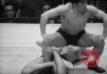 Image of Kimon Kudo beats Jesse James in wrestling New York United States USA, 1938, second 50 stock footage video 65675028783