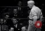 Image of Kimon Kudo beats Jesse James in wrestling New York United States USA, 1938, second 52 stock footage video 65675028783