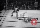 Image of Kimon Kudo beats Jesse James in wrestling New York United States USA, 1938, second 53 stock footage video 65675028783