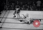 Image of Kimon Kudo beats Jesse James in wrestling New York United States USA, 1938, second 54 stock footage video 65675028783