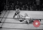 Image of Kimon Kudo beats Jesse James in wrestling New York United States USA, 1938, second 55 stock footage video 65675028783