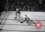 Image of Kimon Kudo beats Jesse James in wrestling New York United States USA, 1938, second 56 stock footage video 65675028783