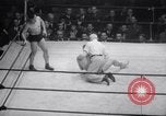 Image of Kimon Kudo beats Jesse James in wrestling New York United States USA, 1938, second 62 stock footage video 65675028783