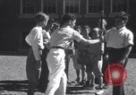 Image of boys refuse to play with a Jewish boy New Haven Connecticut USA, 1940, second 43 stock footage video 65675028784