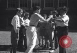 Image of boys refuse to play with a Jewish boy New Haven Connecticut USA, 1940, second 44 stock footage video 65675028784