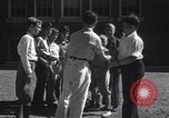 Image of boys refuse to play with a Jewish boy New Haven Connecticut USA, 1940, second 46 stock footage video 65675028784