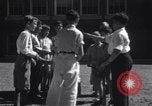 Image of boys refuse to play with a Jewish boy New Haven Connecticut USA, 1940, second 49 stock footage video 65675028784