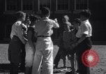 Image of boys refuse to play with a Jewish boy New Haven Connecticut USA, 1940, second 50 stock footage video 65675028784
