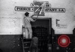 Image of Government's Oil Posters pasted on other companies oil posters Mexico, 1938, second 21 stock footage video 65675028791