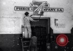 Image of Government's Oil Posters pasted on other companies oil posters Mexico, 1938, second 23 stock footage video 65675028791