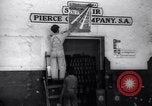 Image of Government's Oil Posters pasted on other companies oil posters Mexico, 1938, second 24 stock footage video 65675028791