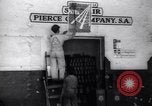Image of Government's Oil Posters pasted on other companies oil posters Mexico, 1938, second 25 stock footage video 65675028791